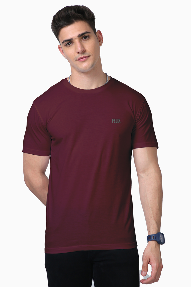 Male model in FELIX Supima cotton t-shirt with grey reflective vinyl logo on chest – minimalist premium gym and streetwear fashion India