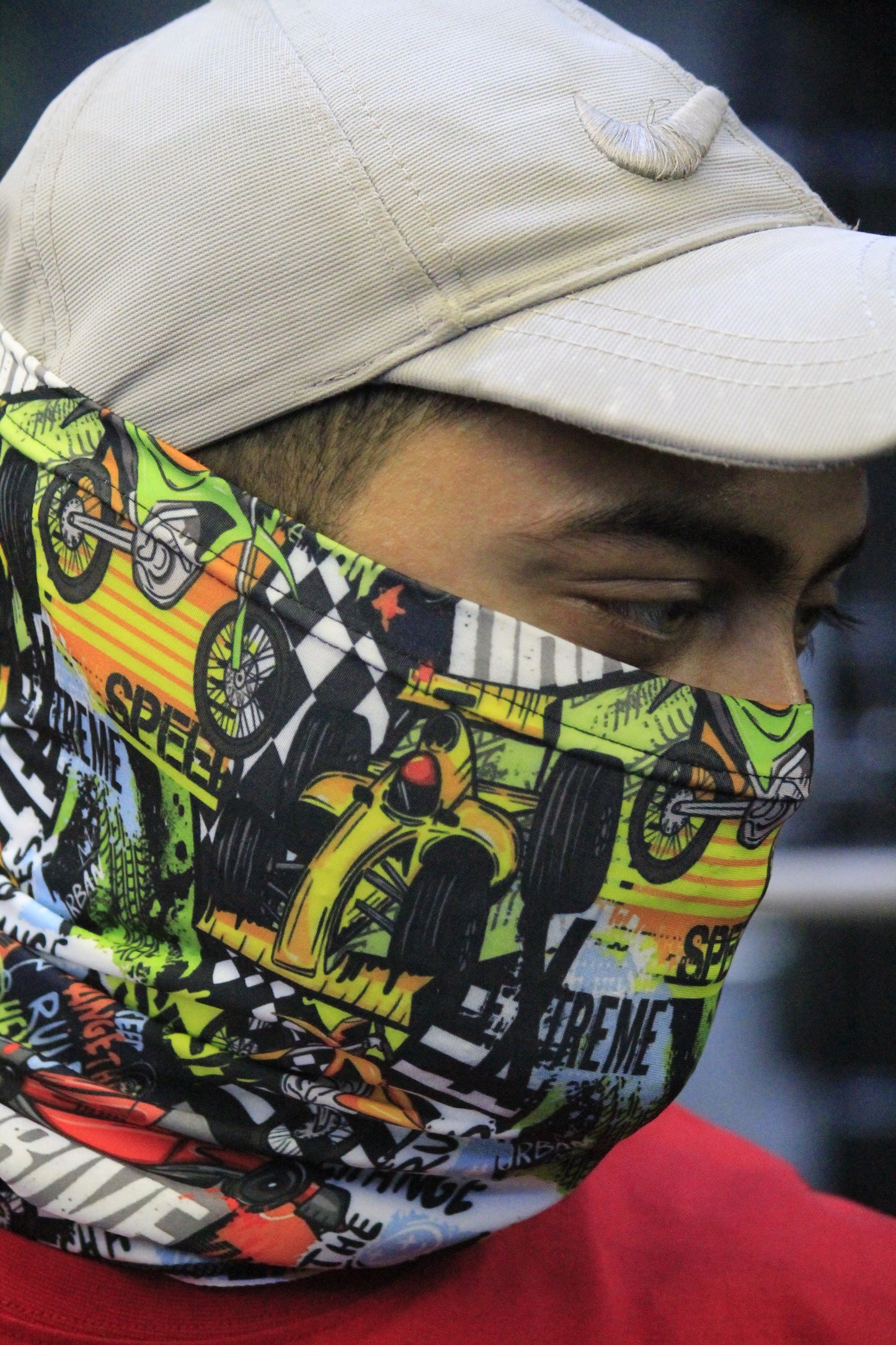 "Man wearing a colorful neck gaiter perfect for summer protection and outdoor use"
