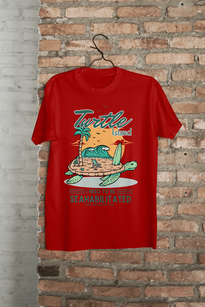 t-shirt featuring a colorful turtle carrying a tropical island with the phrase “I Need to Be Seahabilitated” 